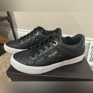 Women’s guess sneakers. black and gold